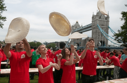 Papa Johns smashing the world record for the most people tossing dough in June 2015